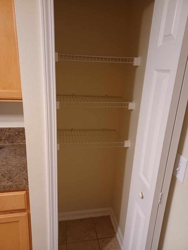 Building Photo - "$500 MOVE-IN SPECIAL! - Beautifully Updated 2/2 Condo in Gated Southside Neighborhood!"