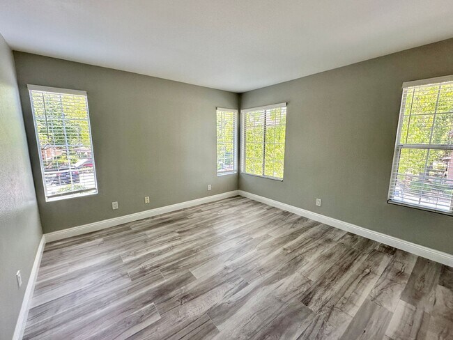 Building Photo - Corner Unit Two Story Townhome in the Beau...