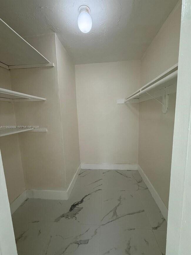 Building Photo - 4298 NW S Tamiami Canal Dr