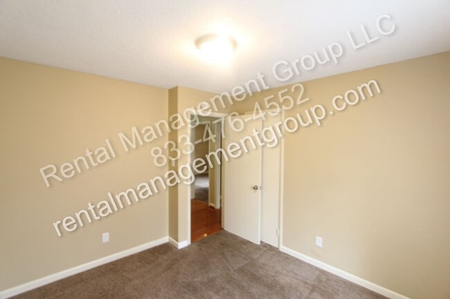 Building Photo - New On The Market! 3BR 2BA + Lower Level D...