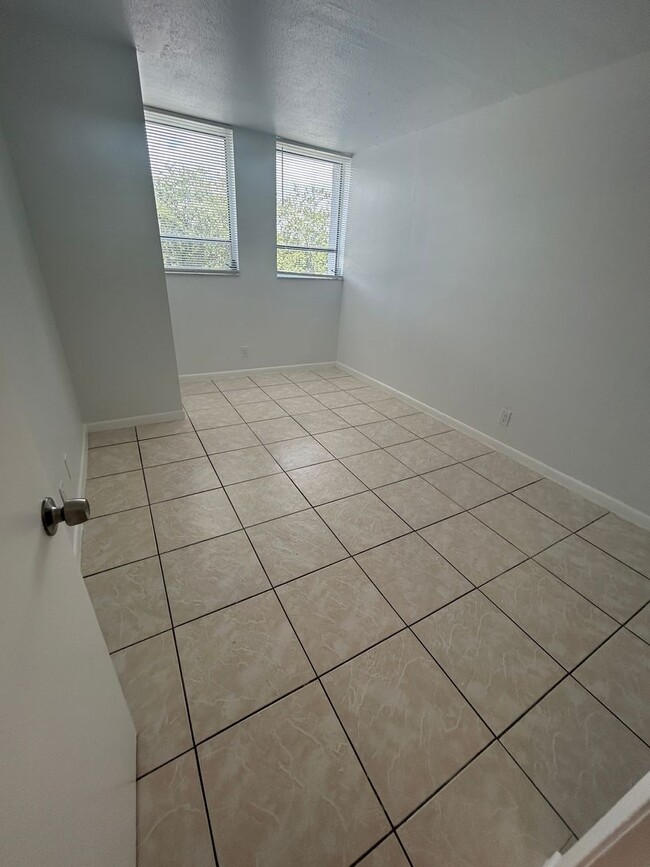 Building Photo - Now Leasing - Two bedroom condo with a pri...