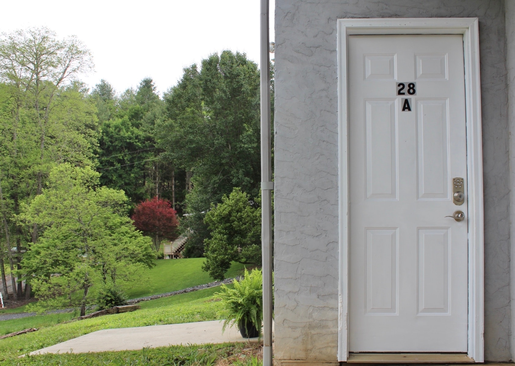 Side entrance directly across from parking - 28 Brown Hollow Ln