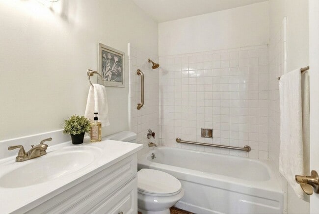 Building Photo - Modern 2-Bedroom Condo with Pool and Koi Pond Views