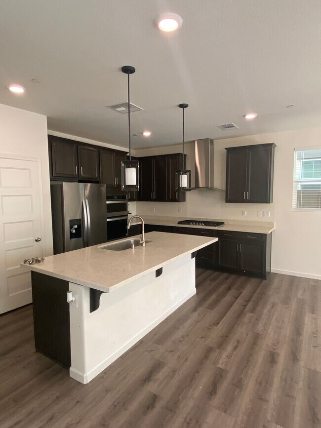 Building Photo - Almost new! Gated 4 Bdrm, 2.5 Bath Solar Home