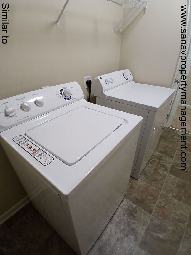 Building Photo - "Welcome to Your Stylish Retreat at Jordan Heights Townhouses!