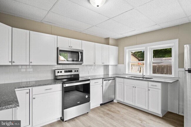 Building Photo - Coming Soon a Spacious Four Bedroom Home i...