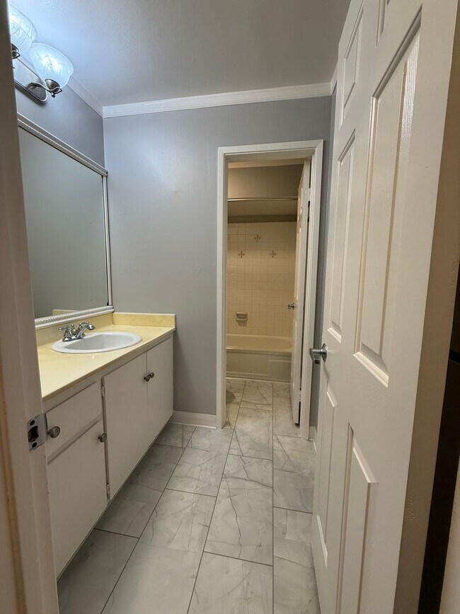 Building Photo - Spacious 2 Bedroom 1 Bath Condo with private patio and storage