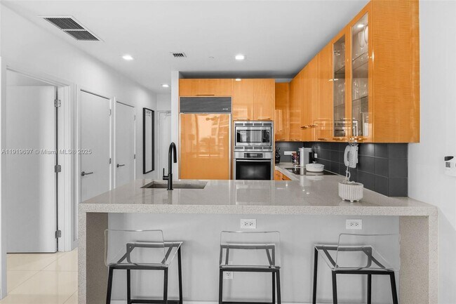 Building Photo - 6799 Collins Ave