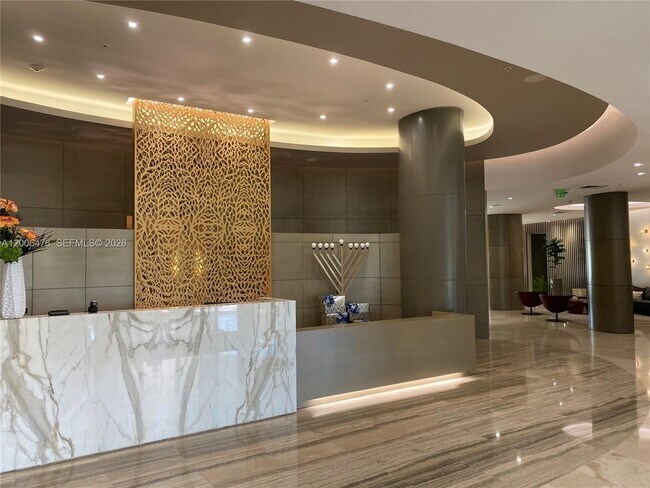 Building Photo - 10275 Collins Ave