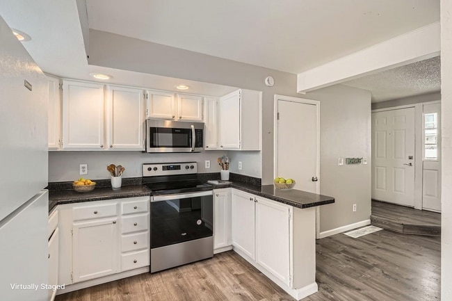 Building Photo - 2-Story Copper Ridge Townhome with Balcony, Fenced Yard & RTD Access