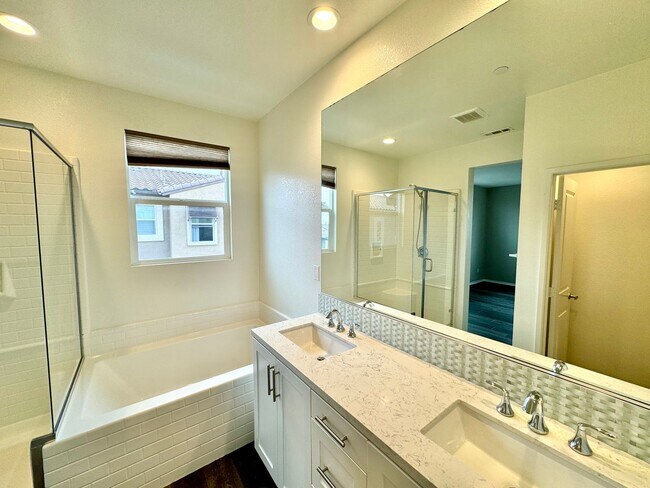 Building Photo - Spacious 4BD/3.5BA Townhome in Oceanside with Community Pool, 2-Car Garage & Covered Balcony