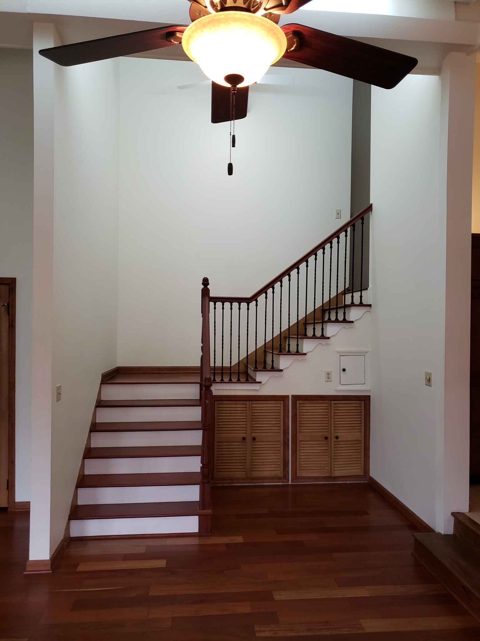 Stairs from the garage to living area. - 7415 Savannah Dr