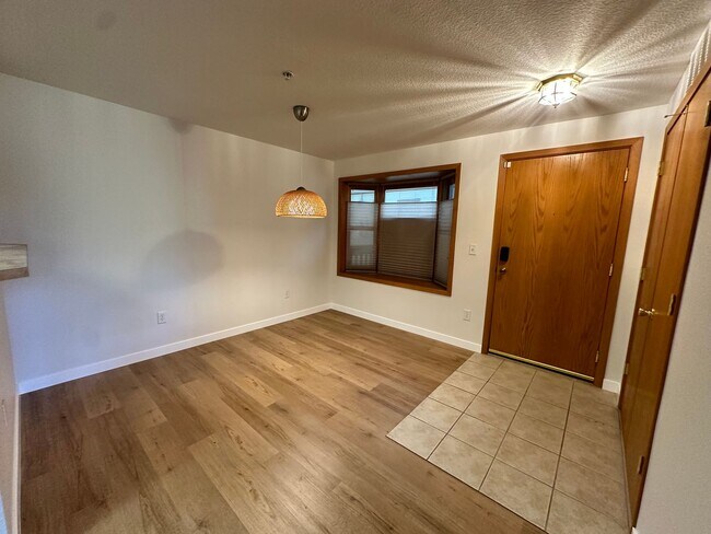 Building Photo - Stylish 3rd Level, Private 2 bedroom Apartment With LVP Flooring, Decks, Gas Fireplace & In-Unit ...
