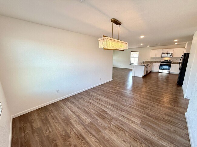 Building Photo - Spacious 4 Bedroom Home with Solar & Modern Upgrades- Available Now!