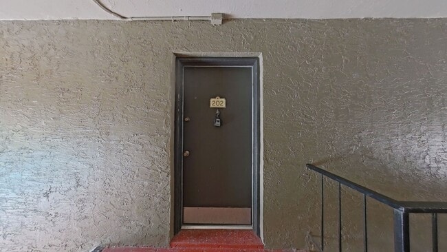 Building Photo - Bright Pool-View Condo with Private Balcony & Open Living Spaces