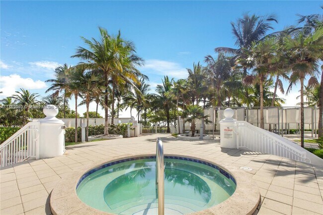 Building Photo - 10275 Collins Ave