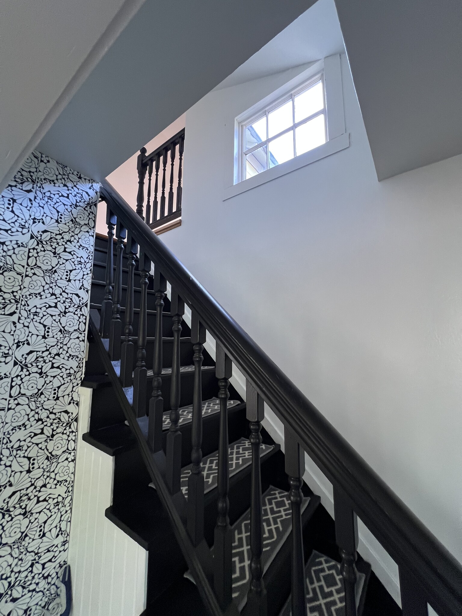 Stairs leading up to the open office area and one bedroom - 557 Washington St