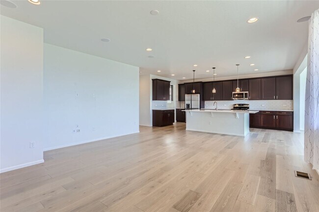 Building Photo - 3-Bedroom Home with Open Floor Plan, Private Balcony & Attached Garage