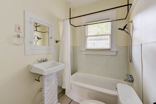 Building Photo - Old-world elegance with modern comfort!