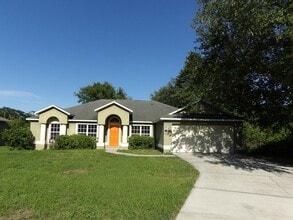 Building Photo - Spacious 4 Bedroom 2 Bath 2 Car Garage 223...
