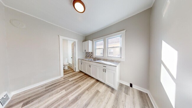 Building Photo - 7408 Dudley Ave