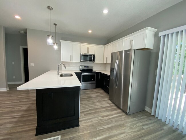 Building Photo - Beautiful and Unique Carriage House style home!