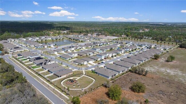 Building Photo - Move-In Ready 2BR/2BA Villa with Den + 2-Car Garage | Lake Nona Adjacent | Suncrest at St. Cloud