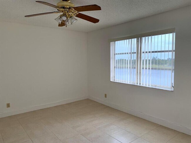 Building Photo - 8710 N Sherman Cir