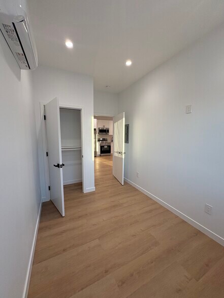 2nd Bedroom, perfect for your little one or office with air conditioning unit. - 7834 S Harvard Blvd
