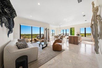 Bright, open living space with floor-to-ceiling windows and panoramic Coral Gables views - 701 Valencia