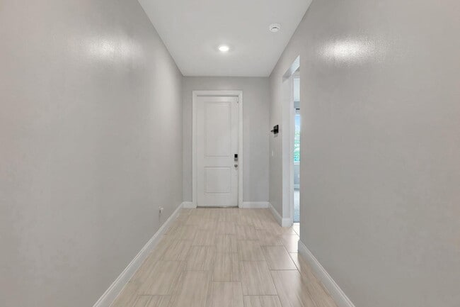 Building Photo - 8606 Dahlia Cir