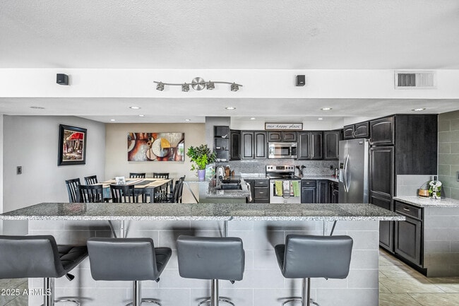 Building Photo - 7940 E Camelback Rd