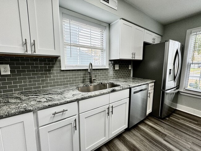 Building Photo - Updated & Ready For You NOW! A Pet-Friendly Home w/Attached Garage, All Appliances Convey - HUGE ...