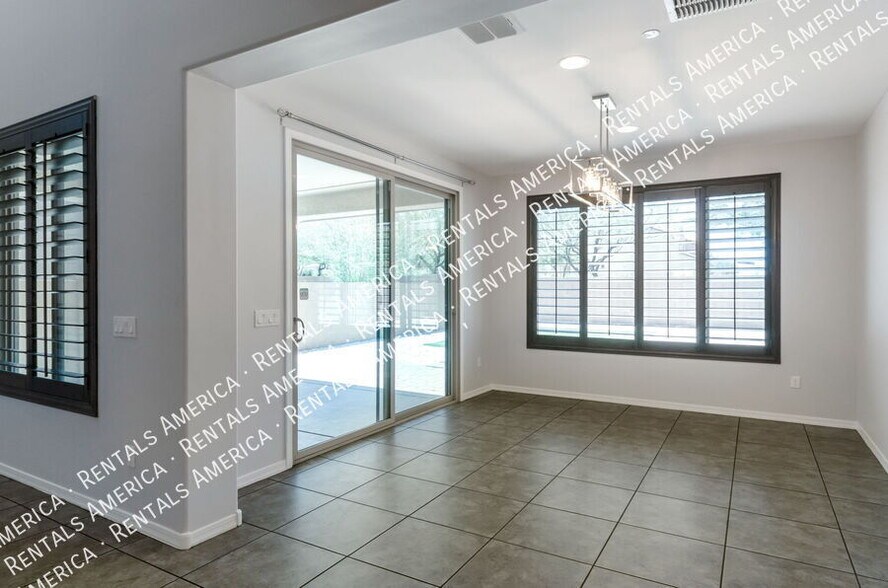 Building Photo - 5768 S Tiger Lily Pl