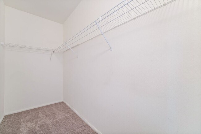 Building Photo - Spacious 3-Bedroom Condo with Garage and Two Private Patios!