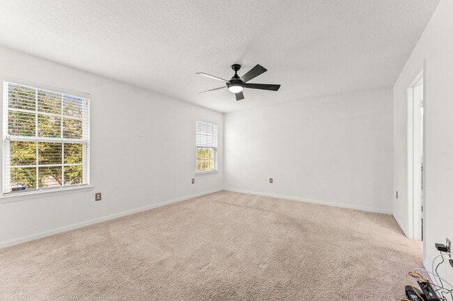 Building Photo - Spacious 3-Bed, 2.5 Bath End Unit Townhome...