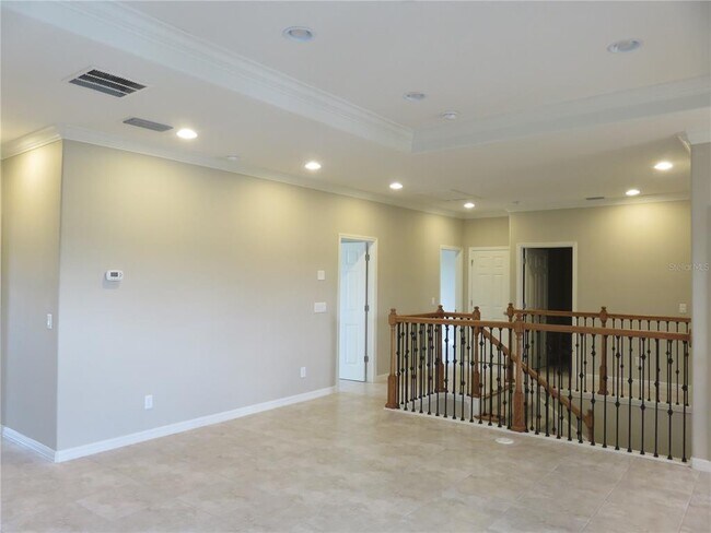 Building Photo - 8828 Tropical Palm Dr
