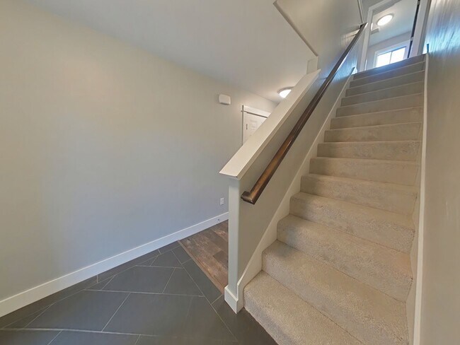 Building Photo - Stunning 3-bedroom, 2.5-bathroom condo with attached 2 stall garage!