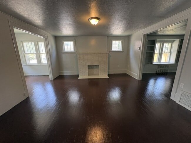 Building Photo - Spacious Akron Single-Family Home with Front Porch, Dining Room, Fireplace & Backyard!
