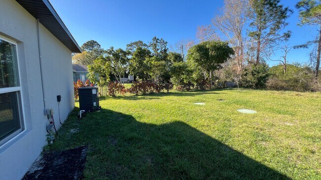 Building Photo - Beautiful 3 Bedroom Palm Bay Home with Upgrades & No Water Bill!