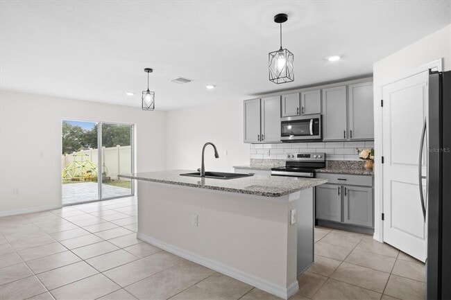 Building Photo - 8673 Triumph Cir