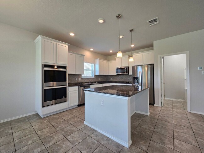 Building Photo - PRICE REDUCTION - AVAILABLE NOW!