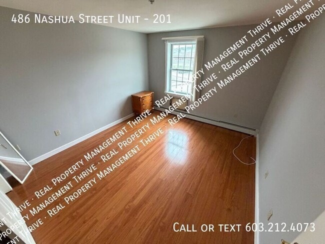 Building Photo - 486 Nashua St