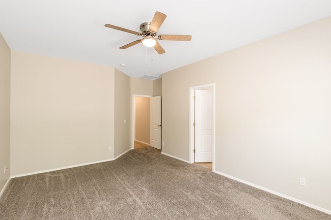 Building Photo - Bright Open Living & a Patio Perfect for Relaxing!