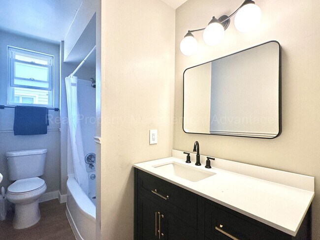 Building Photo - Fully Updated 2BR / 1.5BA – Steps from Dow...