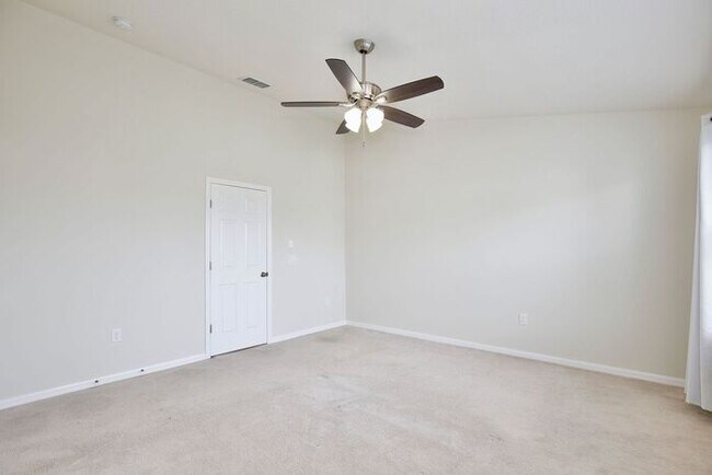 Building Photo - Immaculate Townhome · Dual En-Suite Bedrooms + Flex Loft · Cable & Internet Included · 3.5 Miles ...