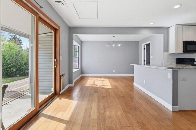 Building Photo - $3,045.95, 3 bed, 2 bath house in Denver with Fenced in Yard and In Unit Laundry!