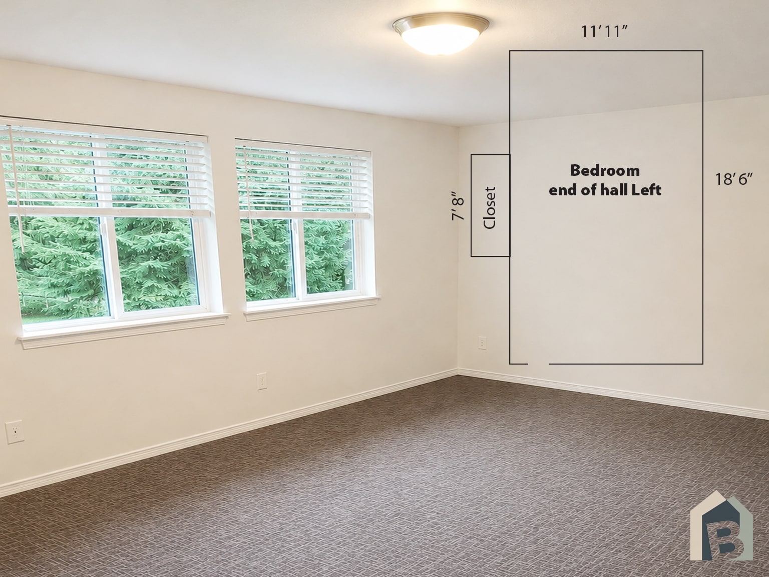 2nd floor large bedroom with view of lawn and mature evergreen trees and double closet - 20981 Port Gamble Rd NE