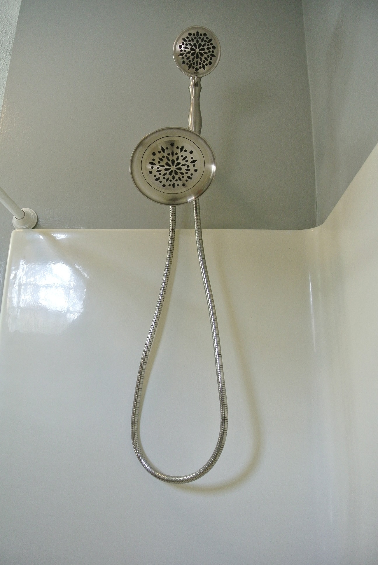 New Delta shower wand and adjustable shower head. - 1104 West Taylor Street