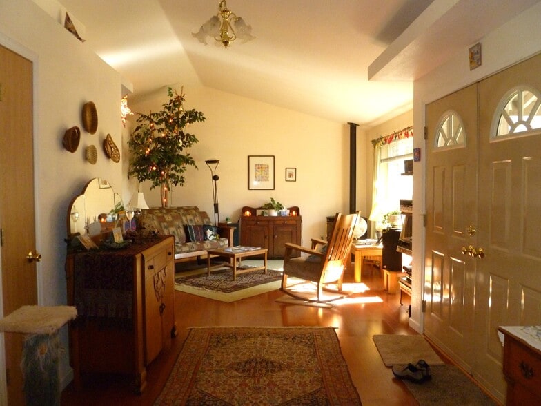 View from the kitchen toward the living room and front entry - 885 Randall St